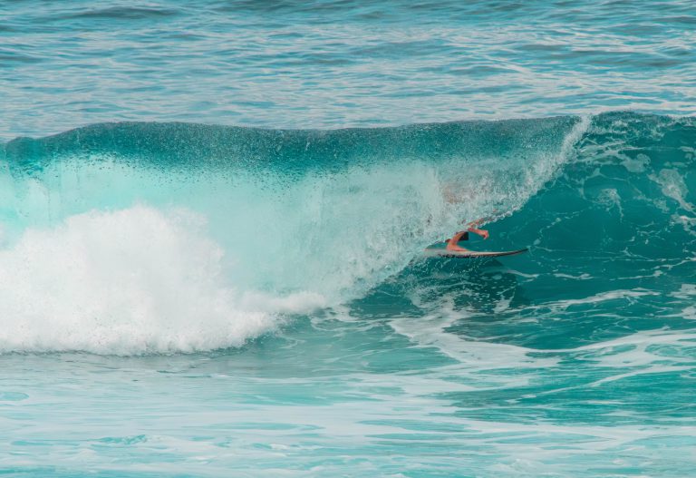 Surfer inside a tube